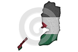 Map and flag of Palestine on felt