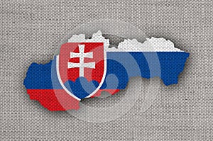 Map and flag of Slovakia on old linen