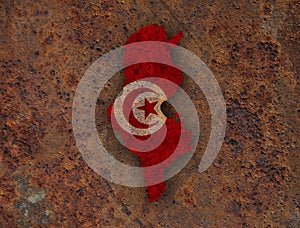Map and flag of Tunisia on rusty metal
