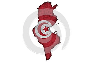 Map and flag of Tunisia on weathered concrete