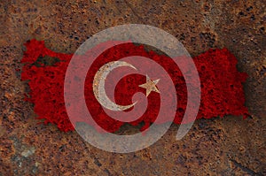 Map and flag of Turkey on rusty metal