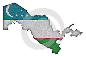 Map and flag of Uzbekistan on felt
