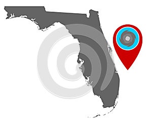 Map of Florida and pin with hurricane warning