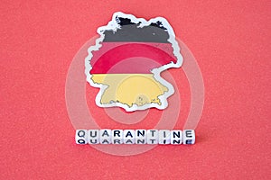 Map of Germany and word quarantine on a red background. Worldwide pandemic concept. Europe