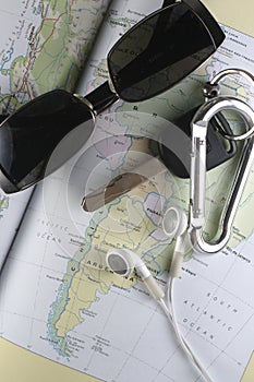 Map, Key, Sunglass and Ear Buds