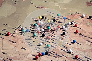 The map is marked with pins of various colors