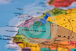 Map of Mauritania with a blue pushpin stuck