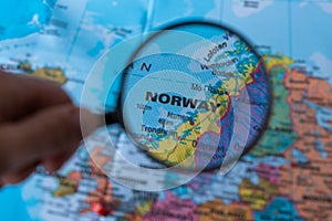 Map of Norwey through magnifying glass.