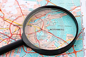 Map of Nurnberg Nuremberg in Germany through magnifying glass, travel destination concept