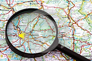 Map of Nurnberg Nuremberg in Germany through magnifying glass, travel destination concept