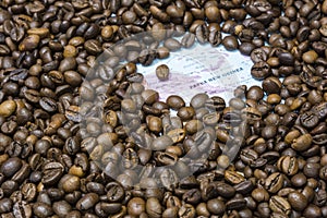 Map of Papua New Guinea under a background of coffee beans