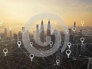 Map pin flat of city, global business and network connection in futuristic technology concept in Asia. Skyscraper and high-rise