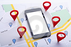 Map With Red Location Marker And Mobile Phone