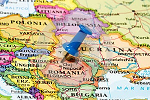 Map of Romania with a blue pushpin