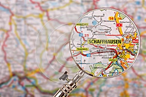 Map of Schaffhausen with magnifying glass on table