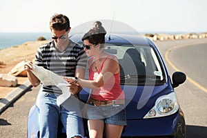 Map, travel and couple with car on road trip for adventure, summer holiday and vacation for freedom. Lost, transport and