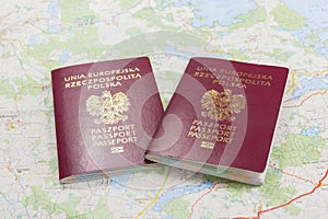 Map and two passports ready to be used. Color photo.