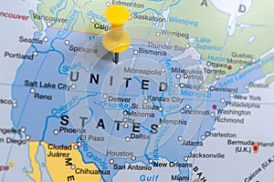 Map of United States with yellow push pin.