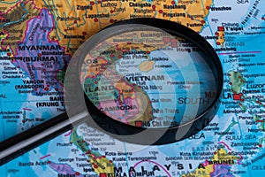 Map of Vietnam through magnifying glass.Close-up.