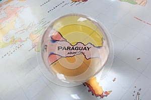 Map view with crystal ball pointing Paraguay