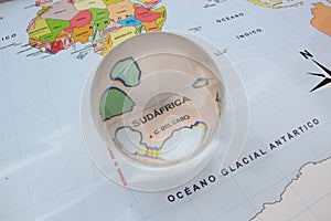 Map view with crystal ball pointing Sudafrica photo