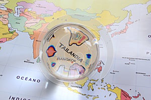 Map view with crystal ball pointing Tailandia photo