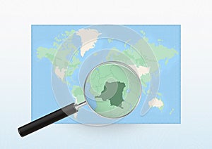 Map of the World with a magnifying glass aimed at DR Congo, searching DR Congo with loupe