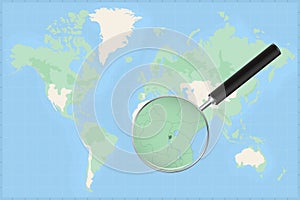 Map of the world with a magnifying glass on a map of Burundi