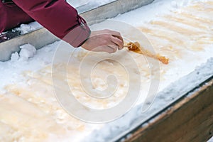 Maple taffy on snow in Montreal
