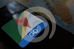 Maps and iphone 11 pro with the Google Maps logo