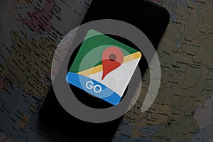 Maps and iphone 11 pro with the Google Maps logo