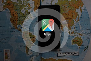 Maps and iphone 11 pro with the Google Maps logo