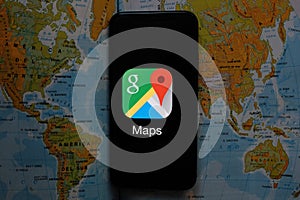 Maps and iphone 11 pro with the Google Maps logo