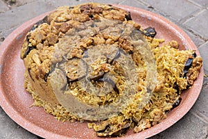 Maqluba is a popular meat and rice dish throughout the Levant photo