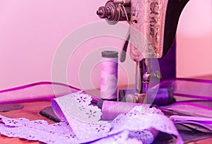 Old sewing machine and sewing elements photo