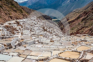 Maras salt mines peruvian Andes Cuzco Peru photo