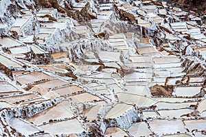 Maras salt mines peruvian Andes Cuzco Peru photo