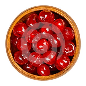 Maraschino cherries, cocktail cherries, in a wooden bowl