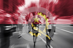 Marathon runner motion blur with blending Angola flag