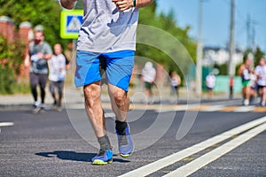 Marathon runners on city road