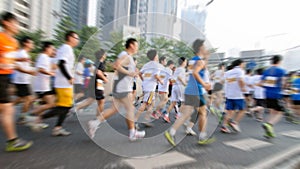 Marathon runners running on the street