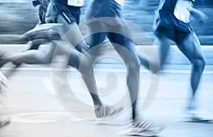 Marathon runners running on the street