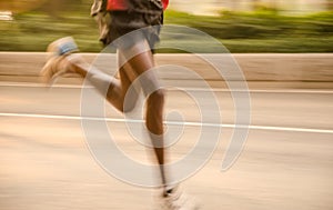 Marathon runners running on the street