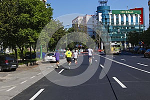 Marathon runners running on a street race