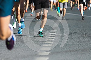 Marathon runners in special sneakers