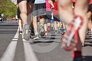 Marathon runners on the street. Healthy lifestyle. Urban athlete endurance