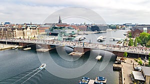 Marathon running race, aerial view of many runners on bridge from above, road racing, sport competition, Copenhagen marathon