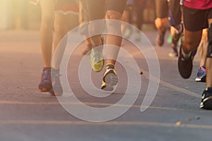 Marathon running race, people feet on city road