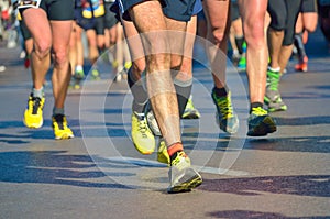 Marathon running race, people feet on road