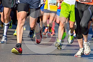 Marathon running race, people feet on road